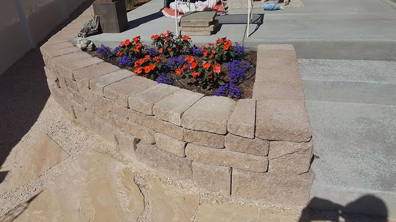 Retaining Wall With Flowers Windsor Landscaping Services Clc Landscape Irrigation